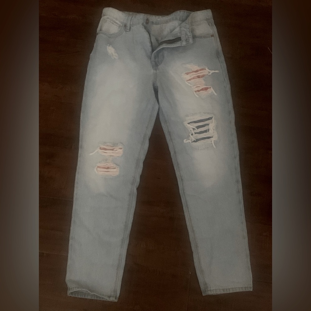 No Boundaries light wash ripped jeans with patches underneath